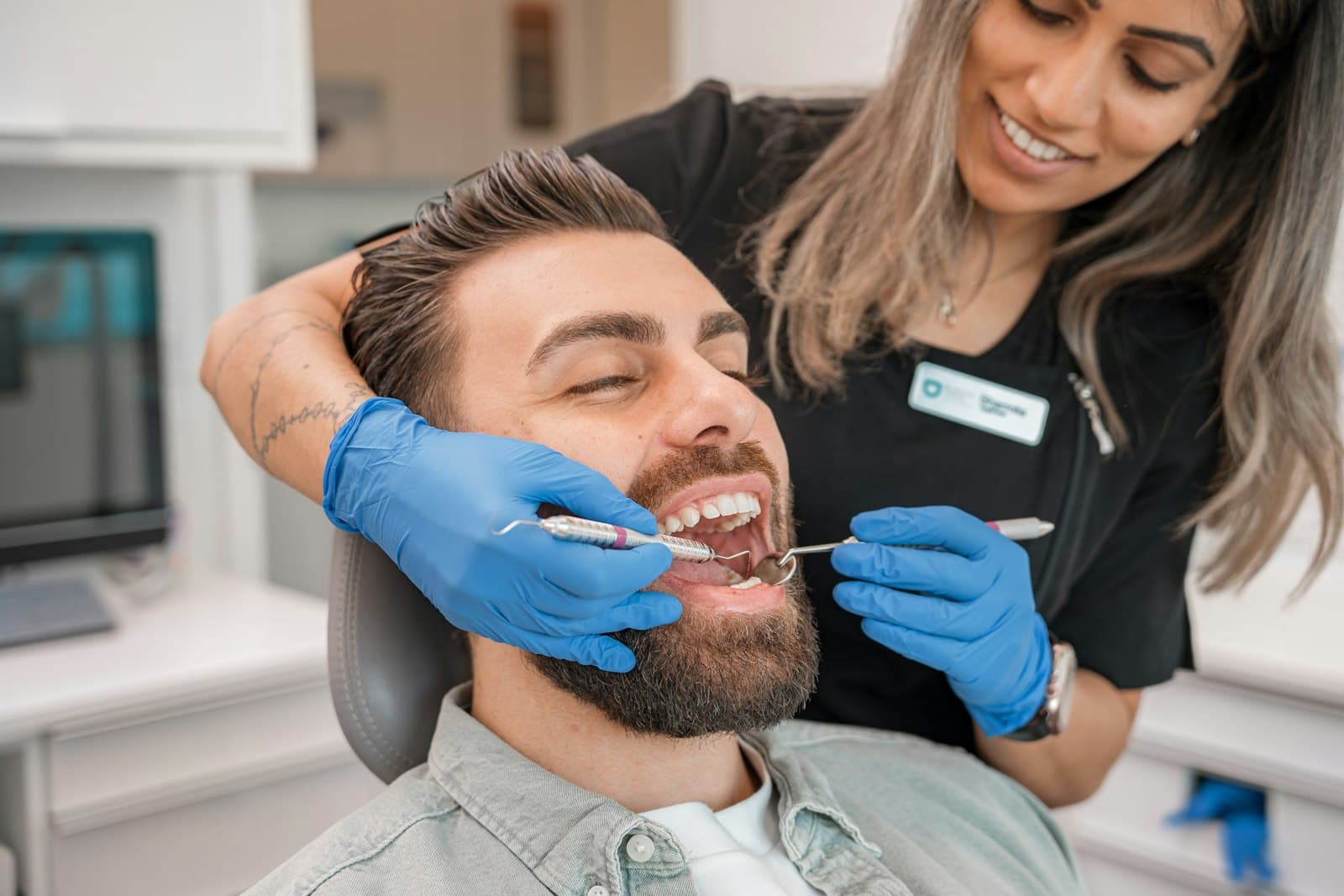 A smiling man having a dental check-up